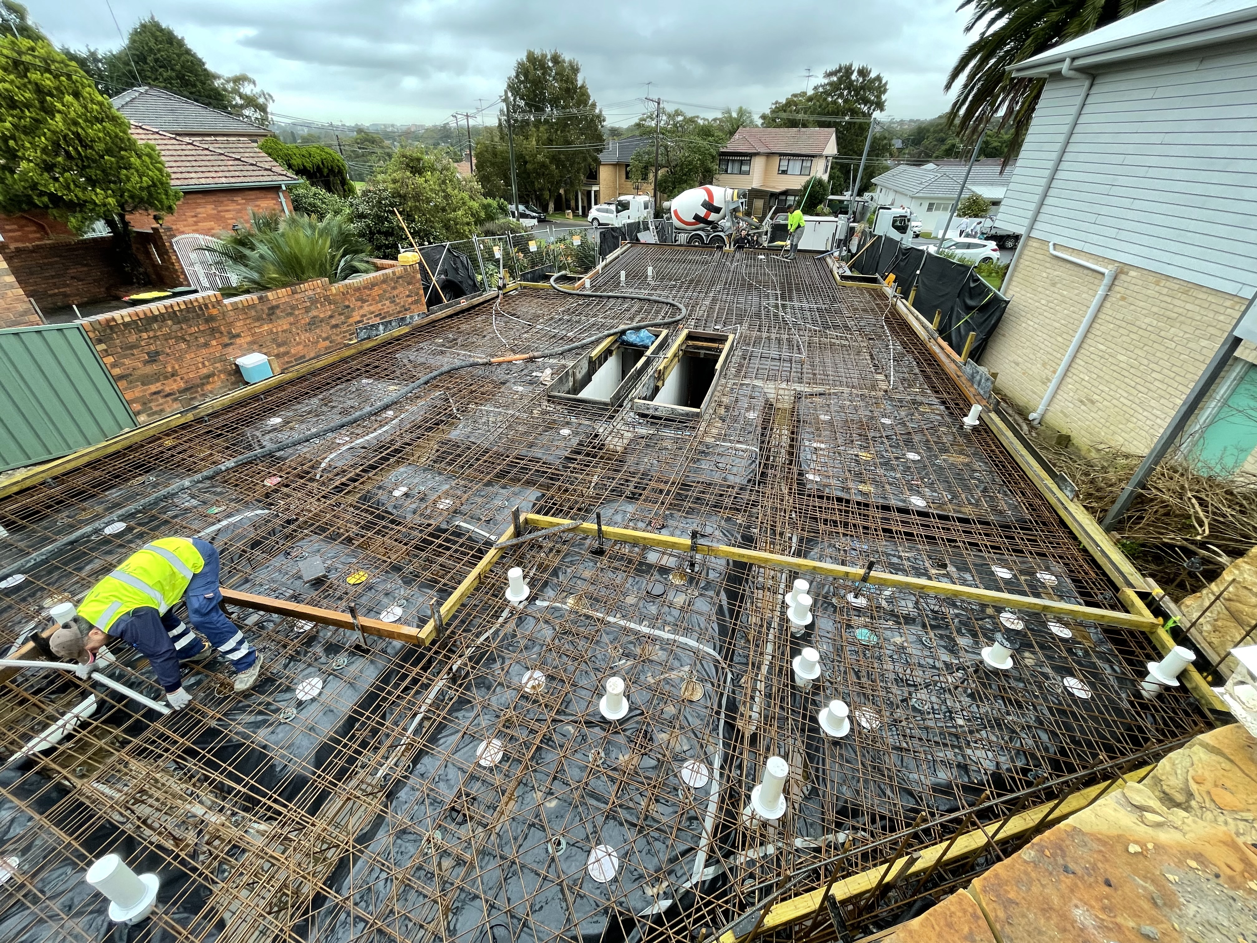 Steel reinforcement and waffle pod setup on site