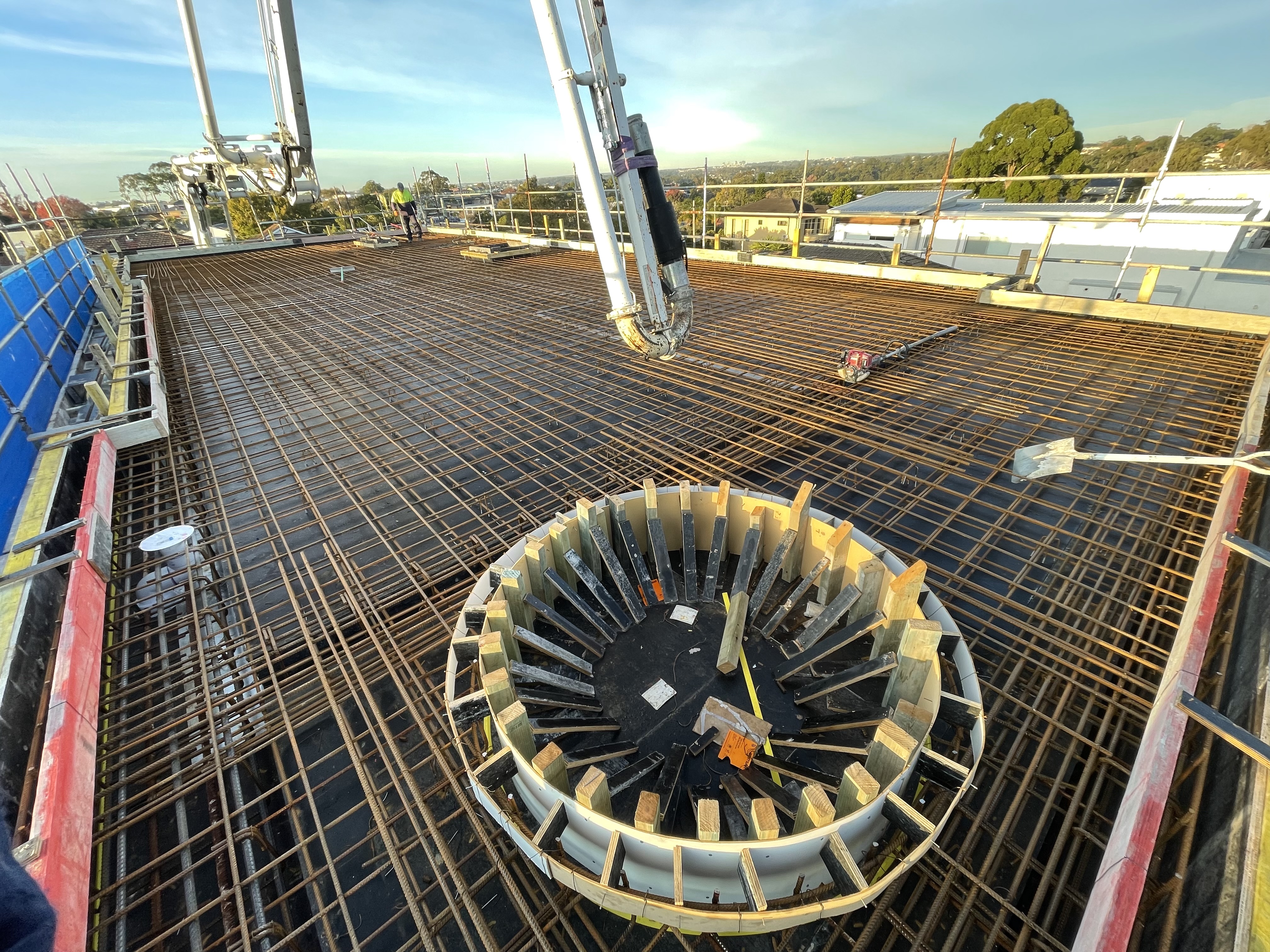 Concrete pumping over steel reinforcement